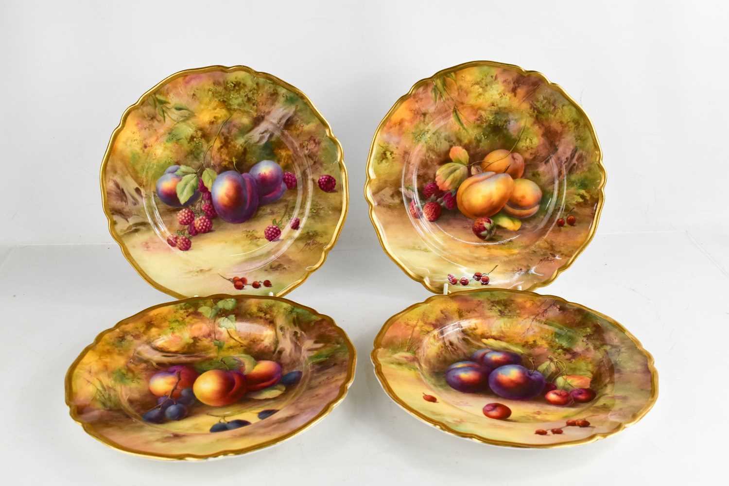 Lot 9 - A set of four Royal Worcester plated by Horice...