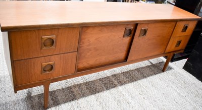 Lot 488 - A vintage 1960's teak sideboard with two...