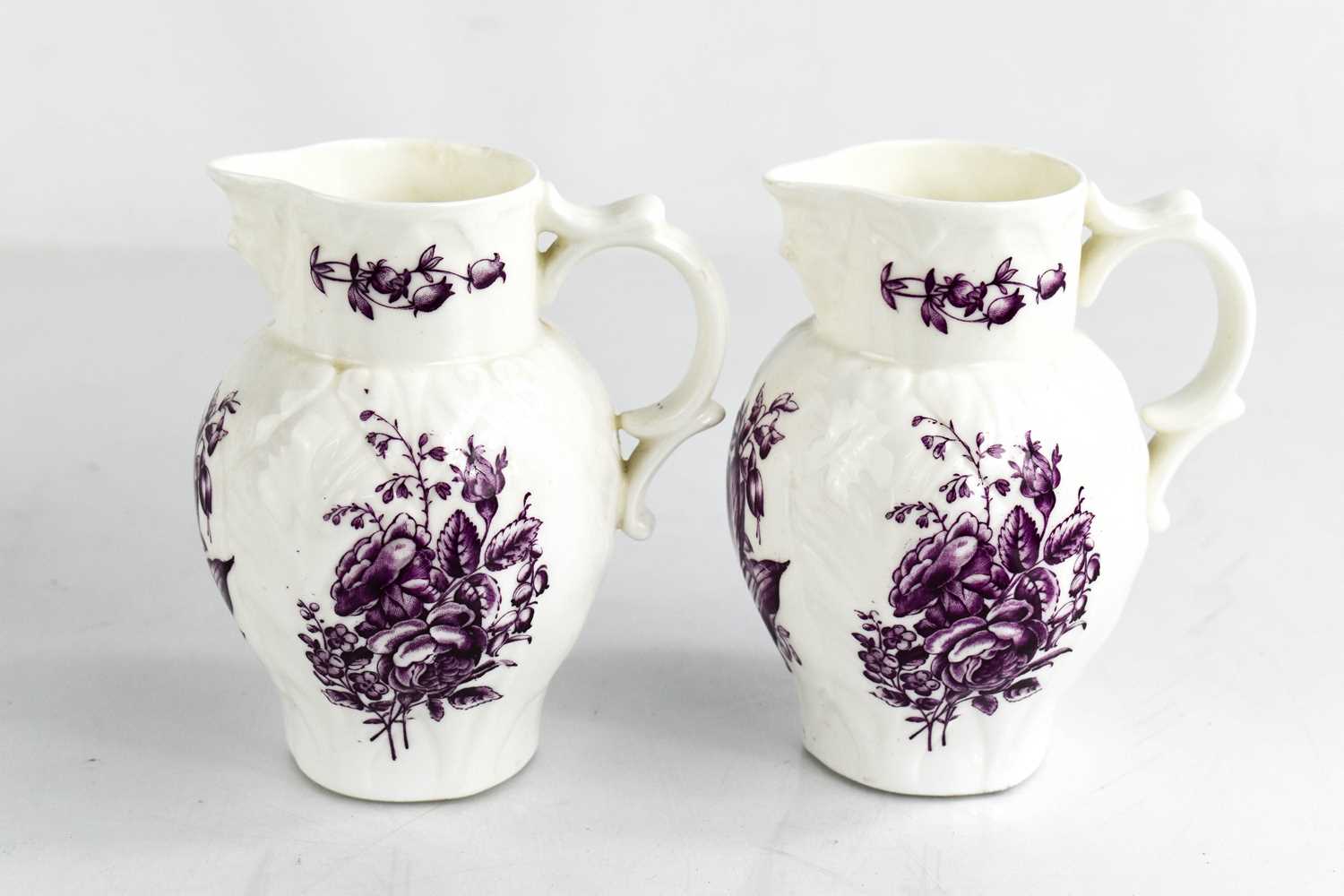 Lot 42 - A Royal Worcester pair of small jugs, modelled...