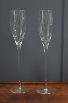 Lot 92 - A pair of tall crystal champagne flutes, the...