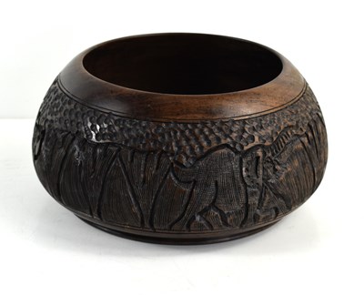 Lot 291 - An African turned hardwood bowl, with carved...