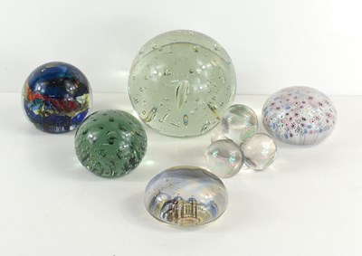 Lot 207 - A group of glass paperweights to include...