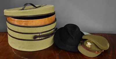 Lot 406 - A vintage wooden lined canvas hat box together...