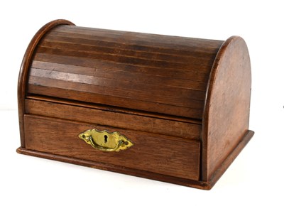 Lot 263 - An Edwardian oak roll top stationery box, the...