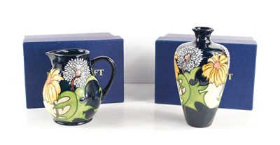 Lot 176 - A Moorcroft vase and jug each in the Daisy May...