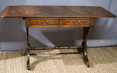 Lot 476 - A mahogany sofa table, with crossbanding and...