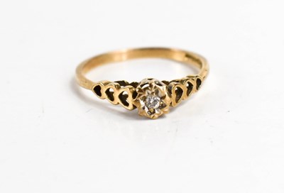 Lot 253 - A 9ct gold and diamond solitaire ring, the...