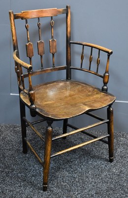 Lot 486 - A 19th century country oak armchair, with...