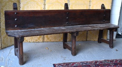 Lot 499 - A 17th century Spanish long bench, composed to...