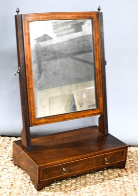 Lot 300 - A Georgian mahogany toilet mirror, fitted with...