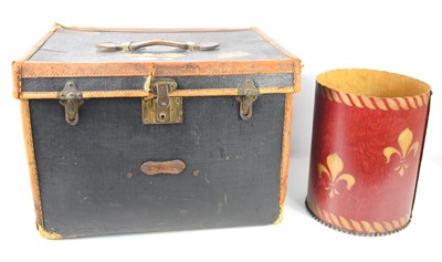 Lot 301 - An antique leather bound travelling trunk, the...