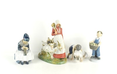 Lot 182 - A group of four Royal Copenhagen figures,...