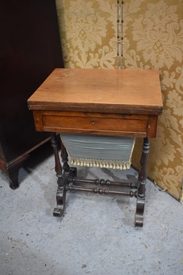 Lot 462 - A Victorian mahogany work table with games...