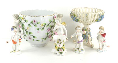 Lot 197 - A group of cherub figurines to include example...