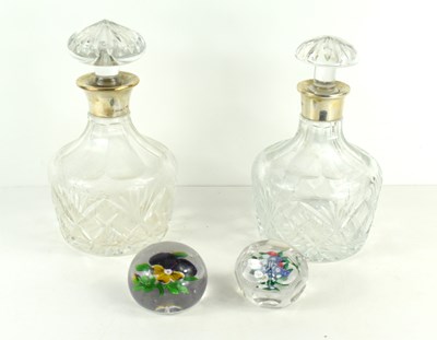 Lot 193 - Two cut glass decanters with silver collars of...