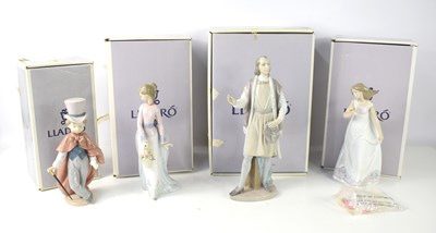 Lot 147 - A group of boxed Lladro figurines to include...