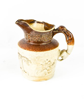 Lot 215 - A Victorian stoneware jug, modelled with...