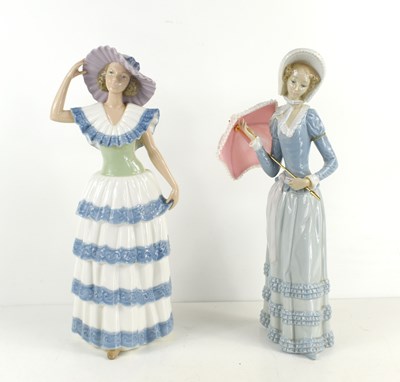 Lot 167 - Two Lladro Nao porcelain figurines comprising...