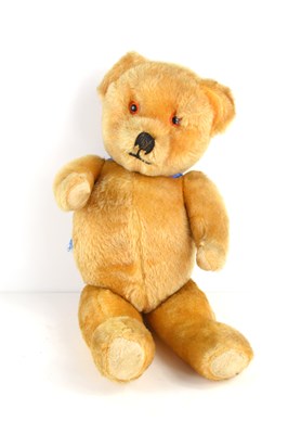 Lot 346 - A vintage wind up musical teddy bear, with...