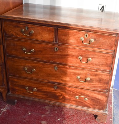 Lot 477 - A Georgian mahogany chest of drawers, the two...