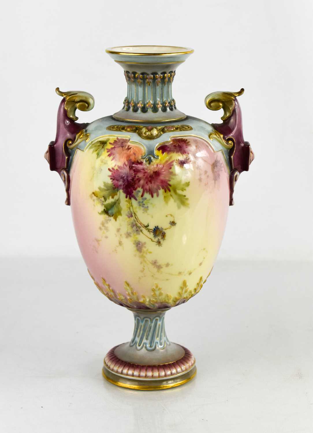 Lot 16 - A Royal Worcester pedesal vase, decorated with...