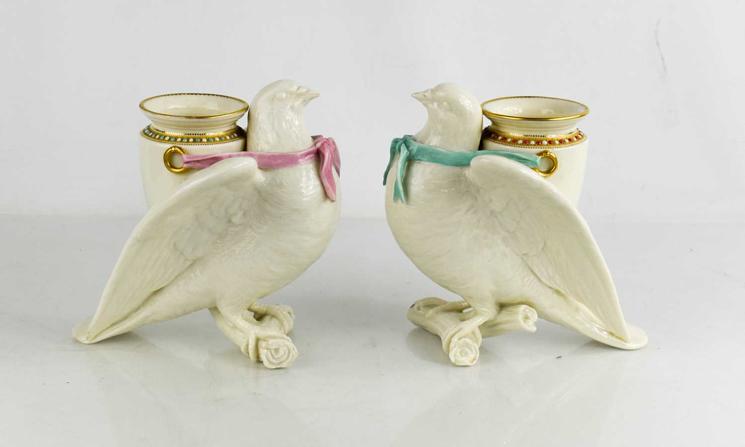 Lot 14 - A pair of Royal Worcester porcelain spill...