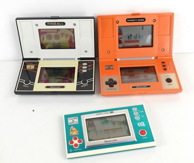 Lot 17 - A group of three Nintendo hand held Game and...
