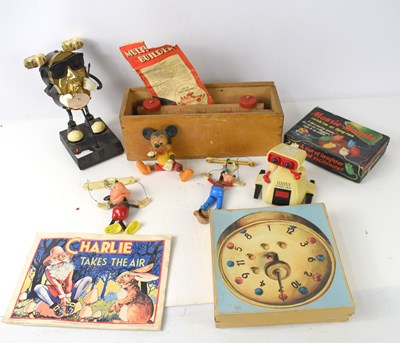 Lot 51 - A vintage Mickey Mouse string puppet together...