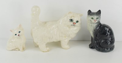 Lot 216 - Two Beswick pottery cats, and a Royal Doulton...