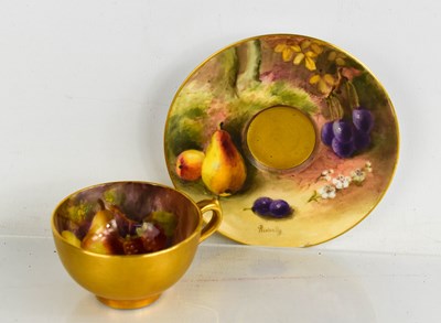 Lot 27 - A Royal Worcester miniature cup and saucer,...