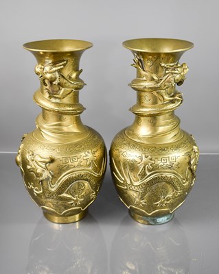Lot 142 - A pair of 19th century Chinese brass vases,...