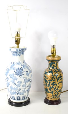 Lot 212 - Two porcelain table lamps, each of baluster...