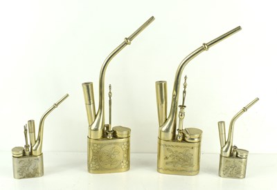 Lot 117 - A group of four Chinese white metal and brass...