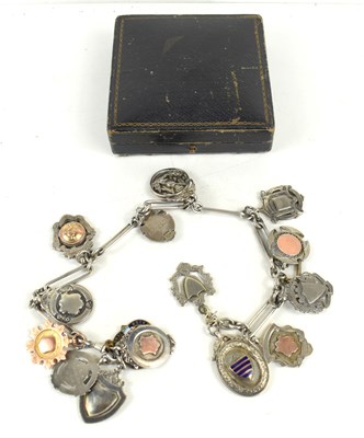 Lot 186 - A group of football medals, some silver,...