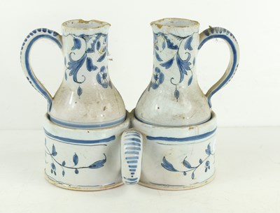 Lot 184 - A late 18th/ early 19th century Delft blue and...