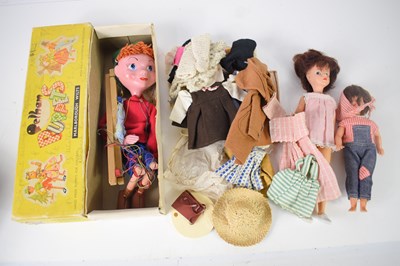 Lot 77 - A vintage Pelham puppet together with Sindy...