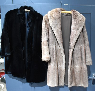 Lot 241 - A vintage musquash ¾ length coat, and a black...