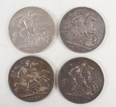 Lot 324 - Four Queen Victoria silver crowns dated...