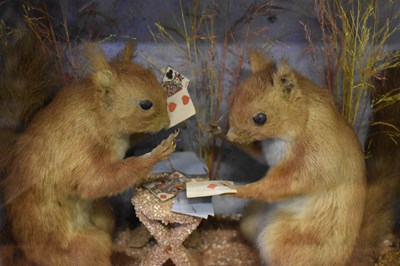 Lot 578 - A Victorian taxidermy diorama with three red...