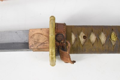 Lot 256 - A WWII Japanese Officers sword and leather...