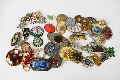 Lot 222 - A group of vintage and later costume brooches,...