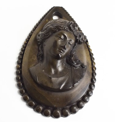 Lot 85 - A Victorian ebony mourning pendant, of...