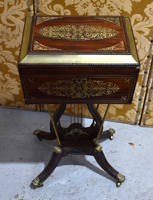 Lot 646 - A Regency rosewood and brass inlaid teapoy on...