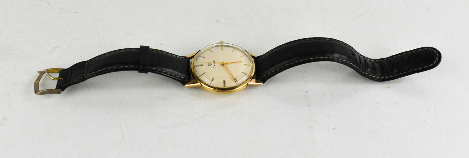 Lot 199 - A Cyma 9ct gold cased wristwatch, with black...