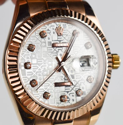 Lot 197 - A Rolex style rose gold coloured wristwatch.