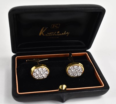 Lot 22 - A pair of 18ct gold and diamond cufflinks by...
