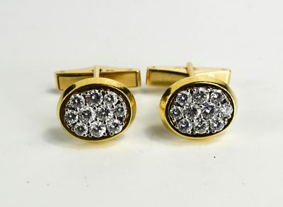 Lot 22 - A pair of 18ct gold and diamond cufflinks by...