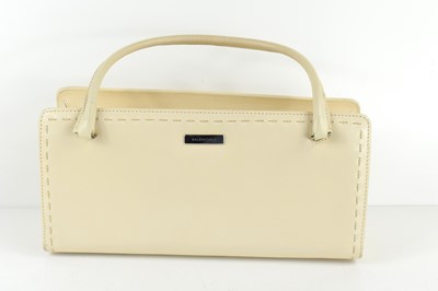 Lot 489 - A cream Balenciaga hand bag, of rectangular...