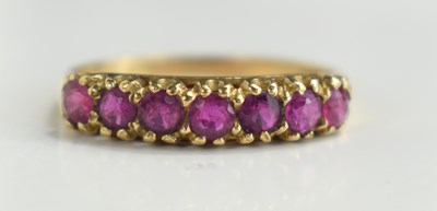 Lot 100 - A 9ct gold seven stone ring, set with old cut...