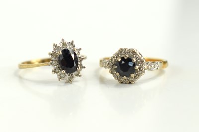 Lot 257 - An 18ct gold, sapphire and diamond dress ring,...